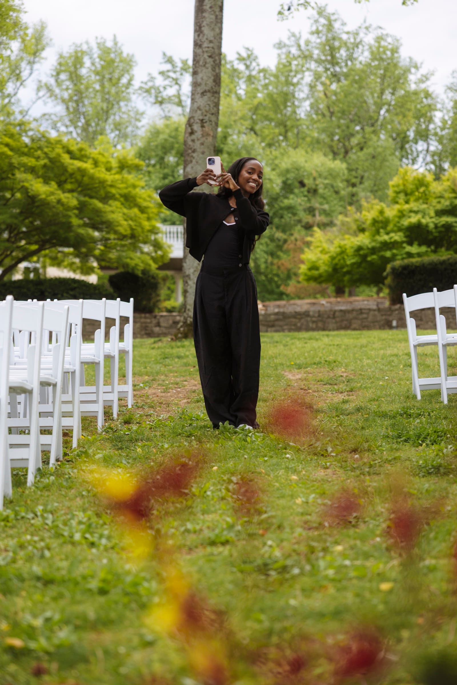 Nashville-based wedding content creator filming on location at an outdoor wedding
