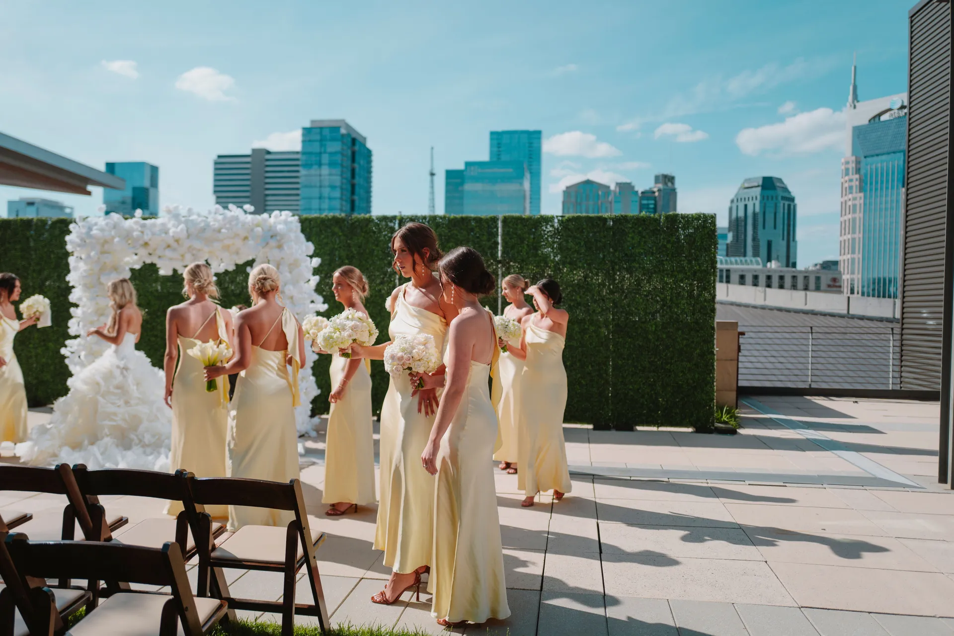 Bridal party on Nashville rooftop with skyline view