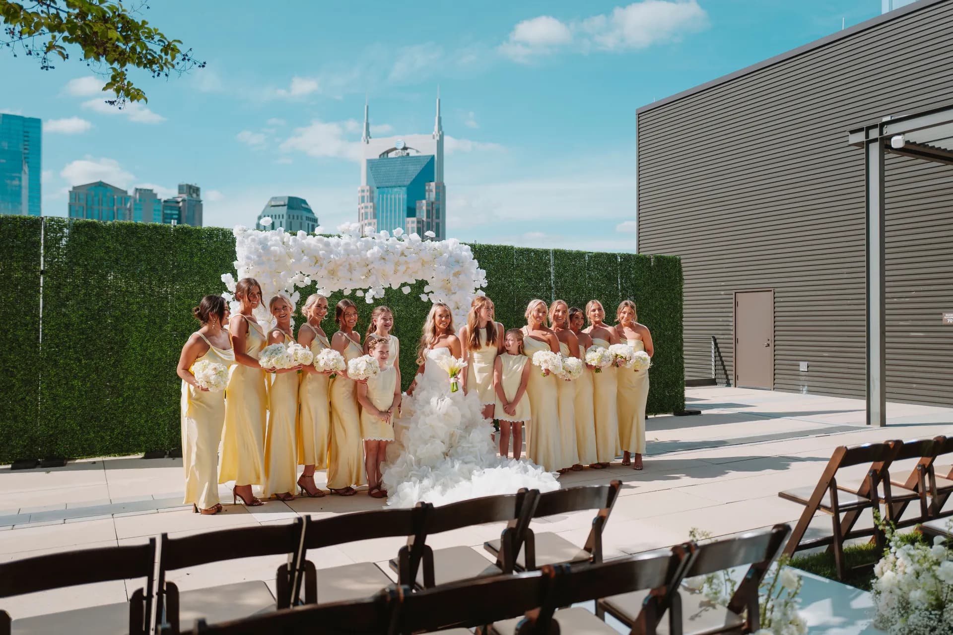 Full bridal party celebration on Nashville rooftop